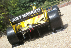 image of a racing car at a wedding at Roundwood in Norwich